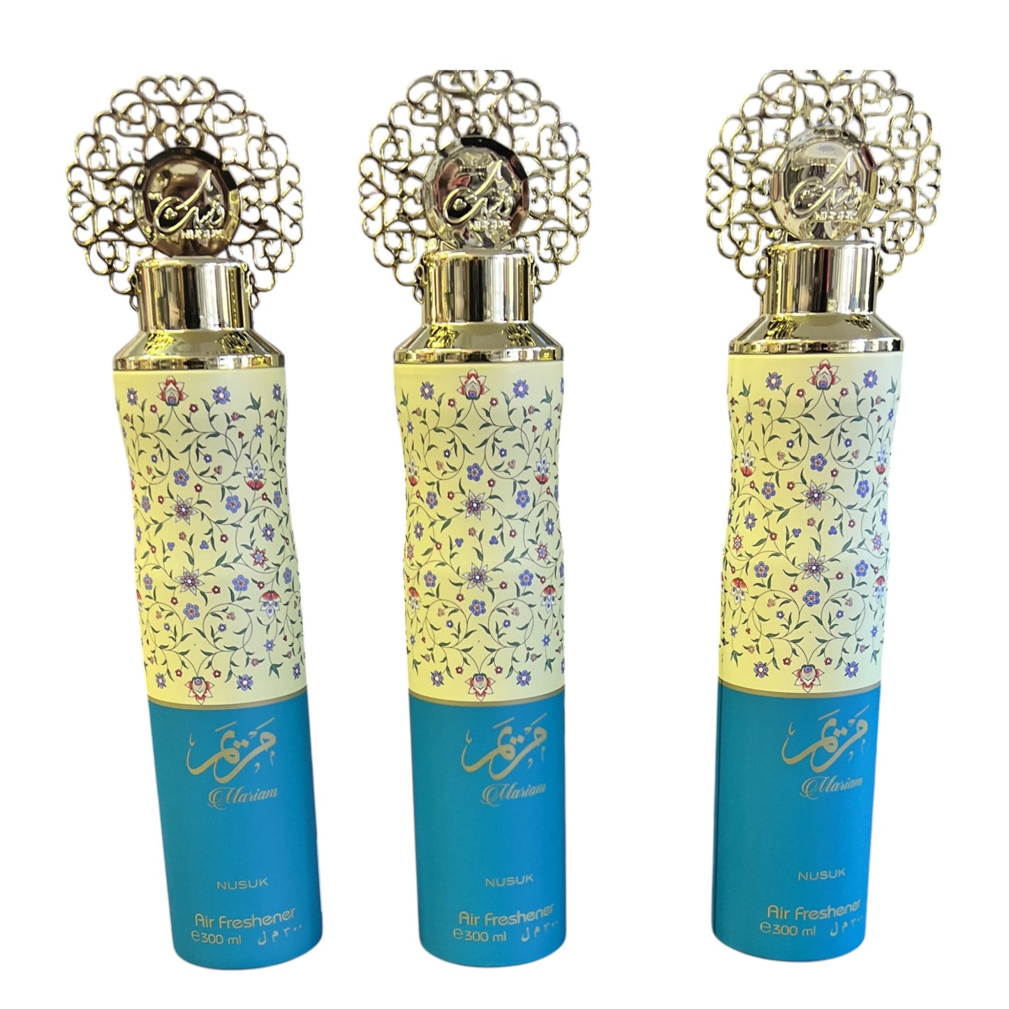 Three bottles of Mariam air freshener with decorative caps and floral patterns on the labels.