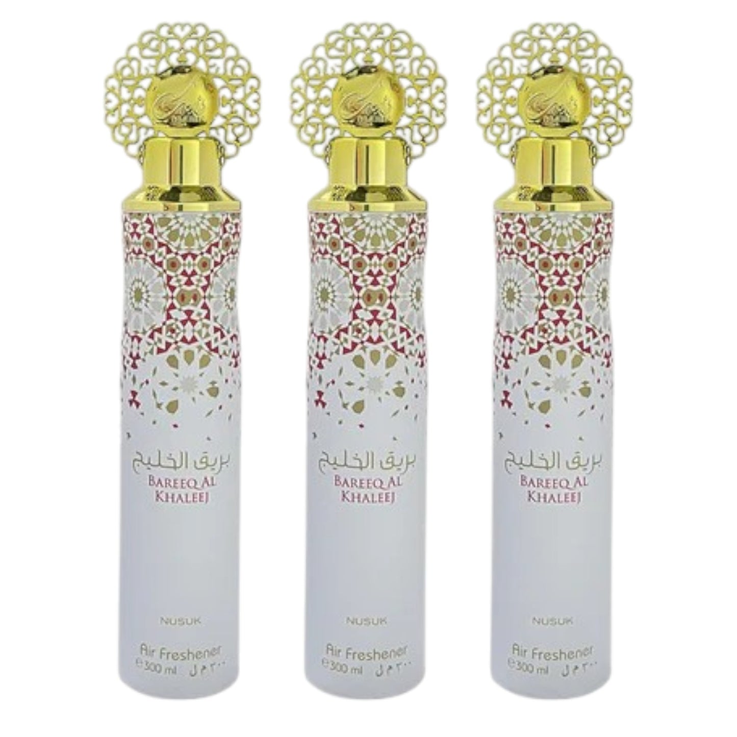 Three bottles of Bareeq Al Khaleej air freshener with decorative caps and floral patterns on the labels.