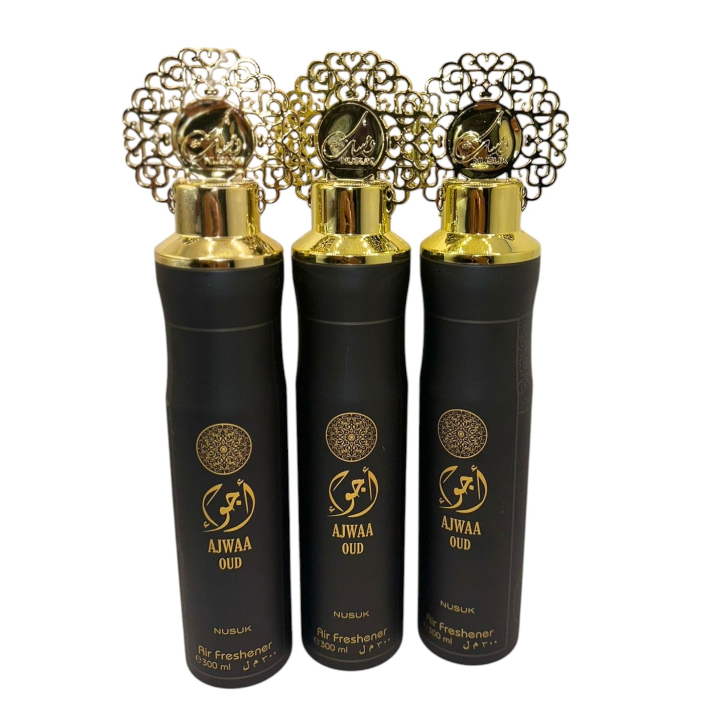 Three black spray bottles of Ajwaa Oud air freshener with gold-colored caps and decorative gold text on the front.