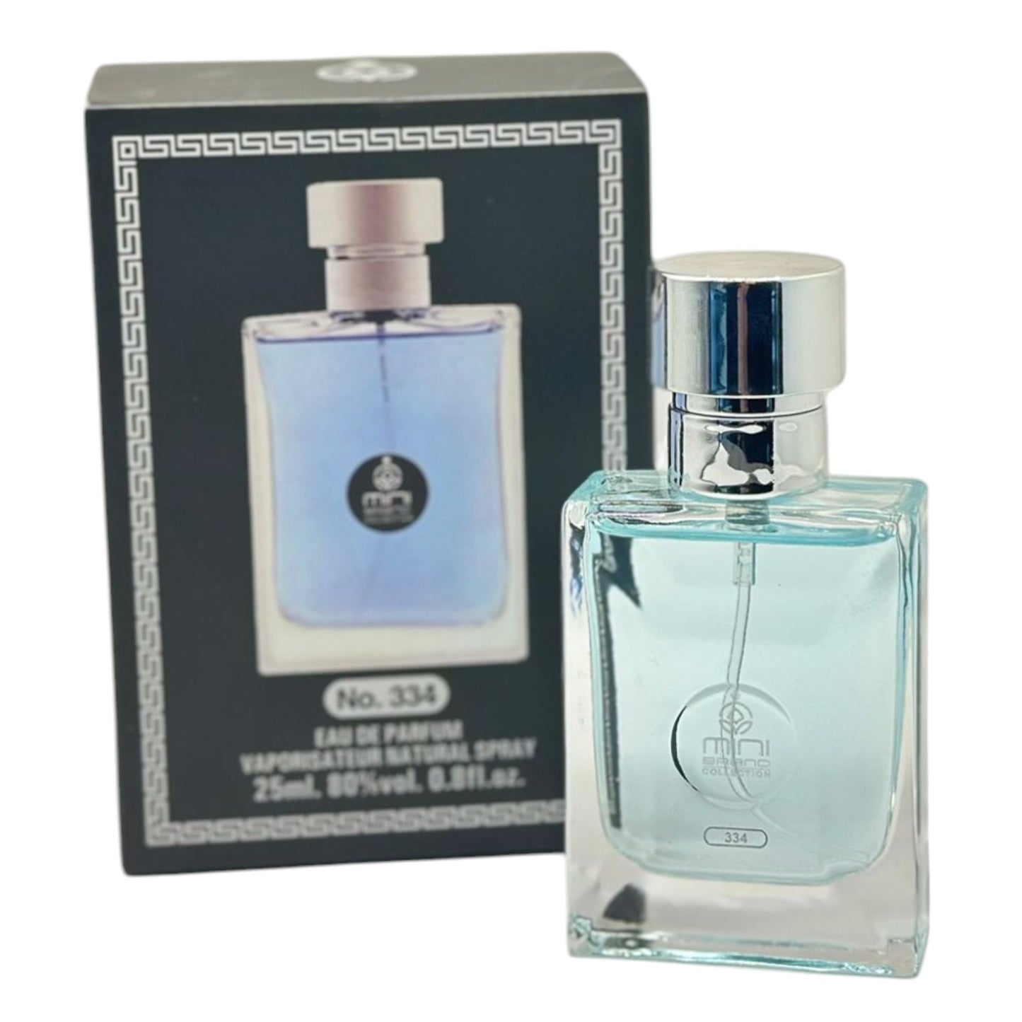 A boxed Mini Brand Eu De 30ml perfume bottle, with the perfume bottle visible in the foreground. The packaging is predominantly black with gold accents, and the perfume bottle is clear with a light blue liquid inside.