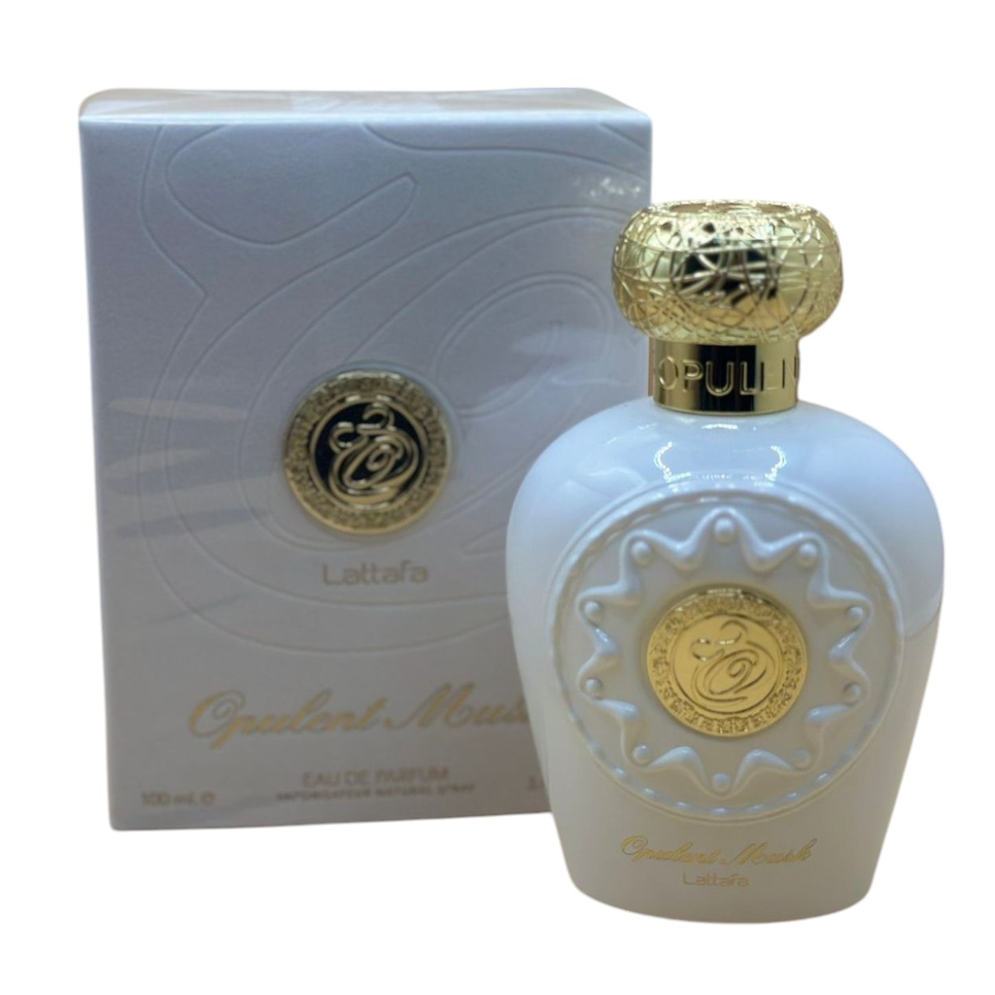 A perfume bottle with a white label and gold-colored cap, next to its packaging box with a design that includes the name 'Opulent Musk'.