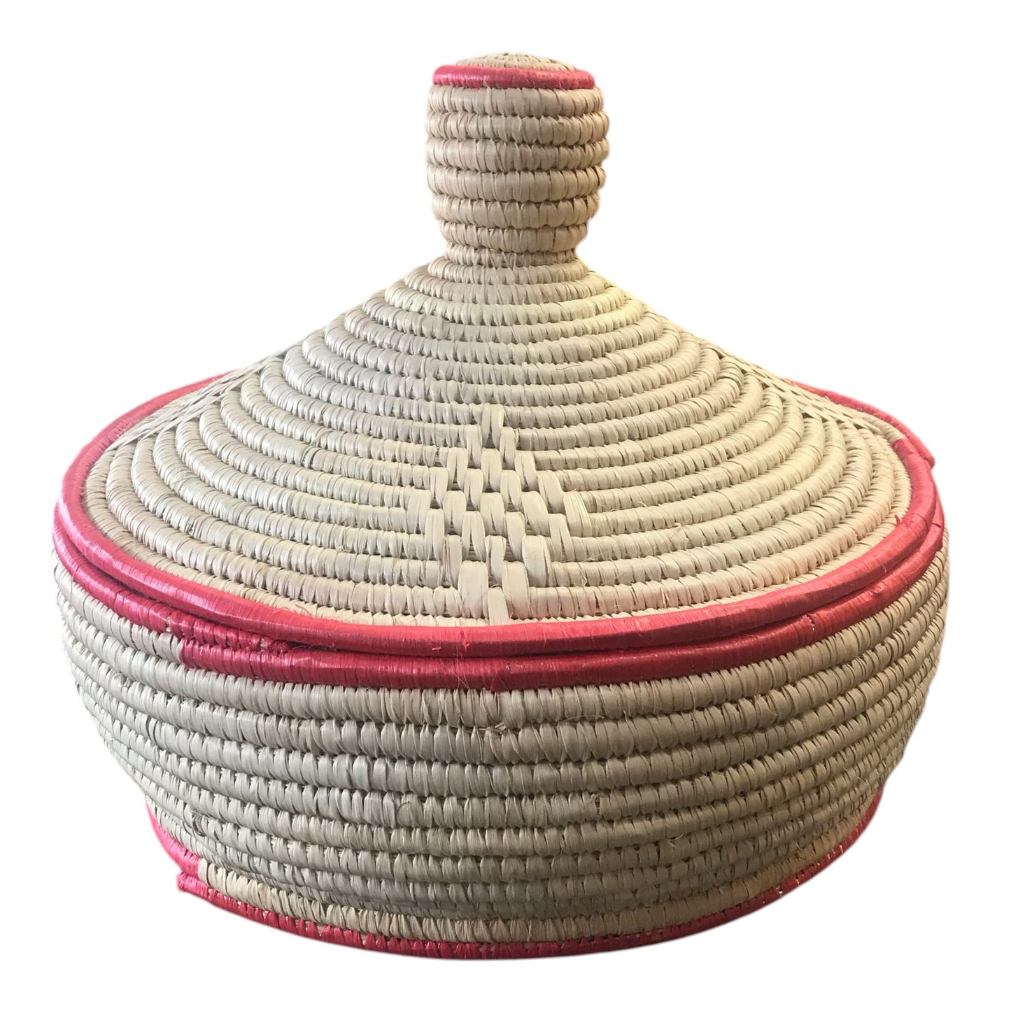 Woven basket with pink accents on a white background