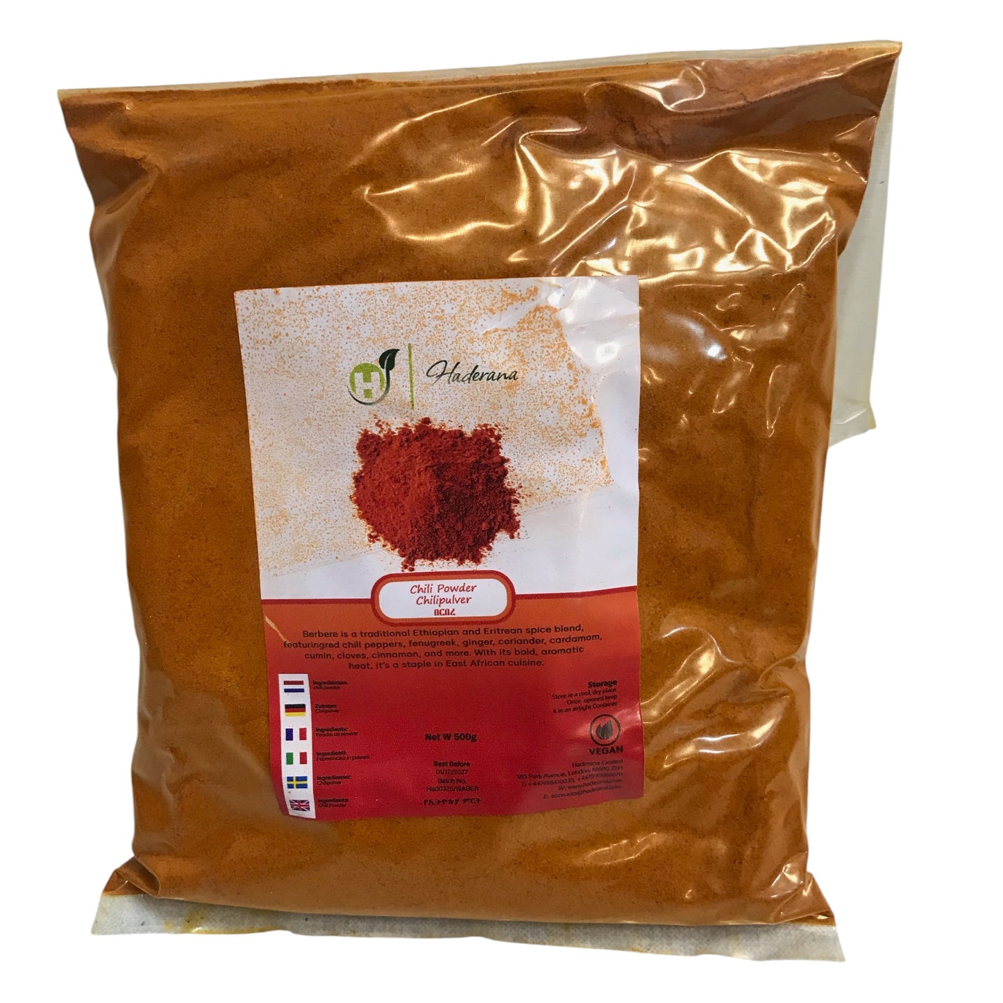 Bag of red chili powder with a label on a white background