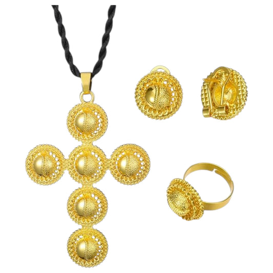 A set of Traditional Habesha women's jewellery, including a gold-plated cross necklace, earrings, and a ring, displayed against a white background.