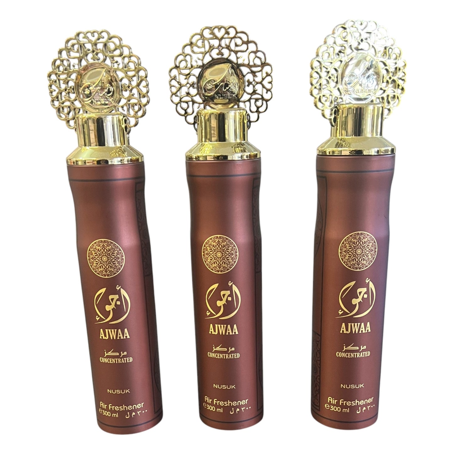 Three bottles of Ajwaa concentrated air freshener with decorative caps, displayed against a white background.