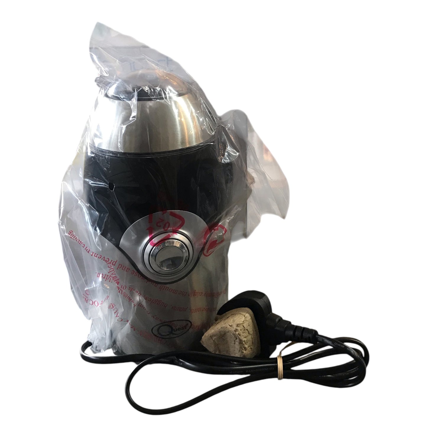 Electric coffee grinder with a plastic bag on a white background