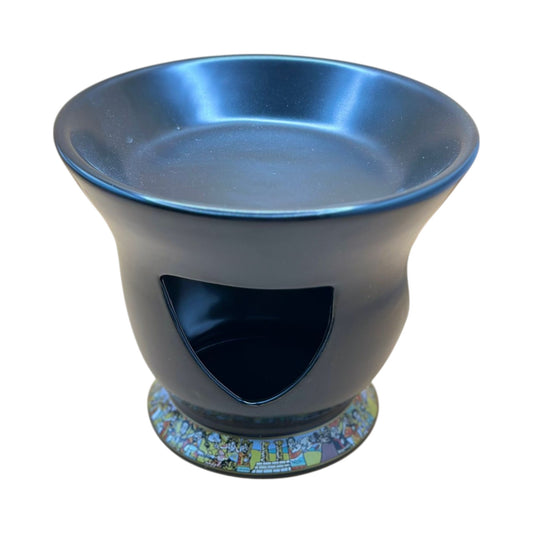 A traditional ceramic Shekla Tibs pot, which is used for cooking Habesha dishes, with a black exterior and interior, featuring a decorative pattern around the base.