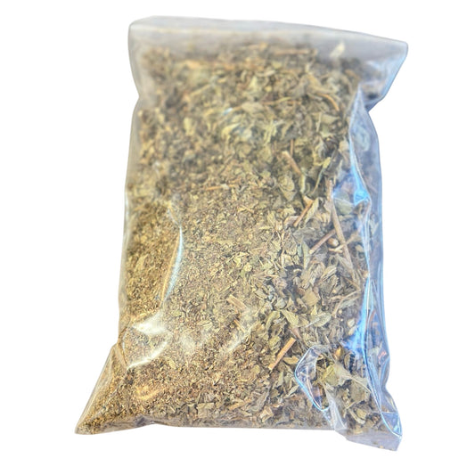 A clear plastic package containing ground butter spice mix.