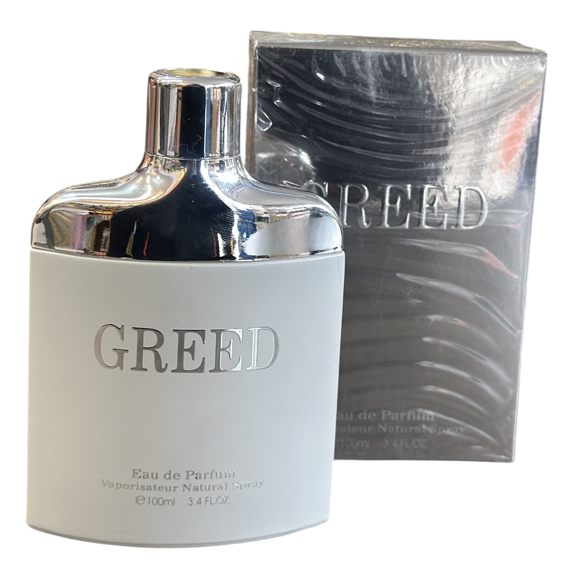 Greed perfume bottle and packaging on a white background