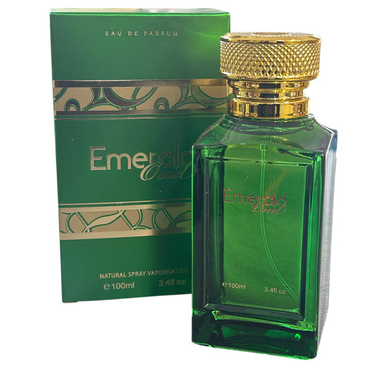 Green perfume bottle with gold cap and matching box on a white background