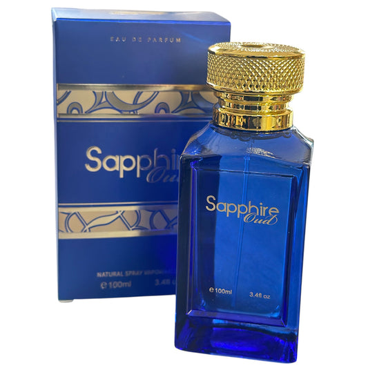 Blue Sapphire Oud perfume bottle with gold cap and matching box on a white background