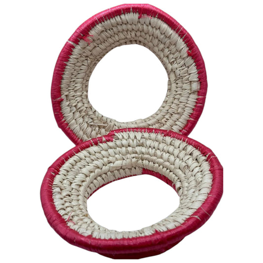 A traditional Eritrean and Ethiopian palm leaf pot holder, handmade and designed for holding hot pots.