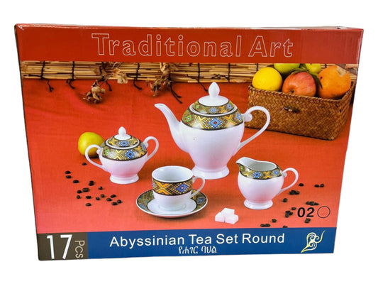 A boxed tea set with a design resembling traditional Eritrean and Ethiopian pottery, including a teapot and several cups.