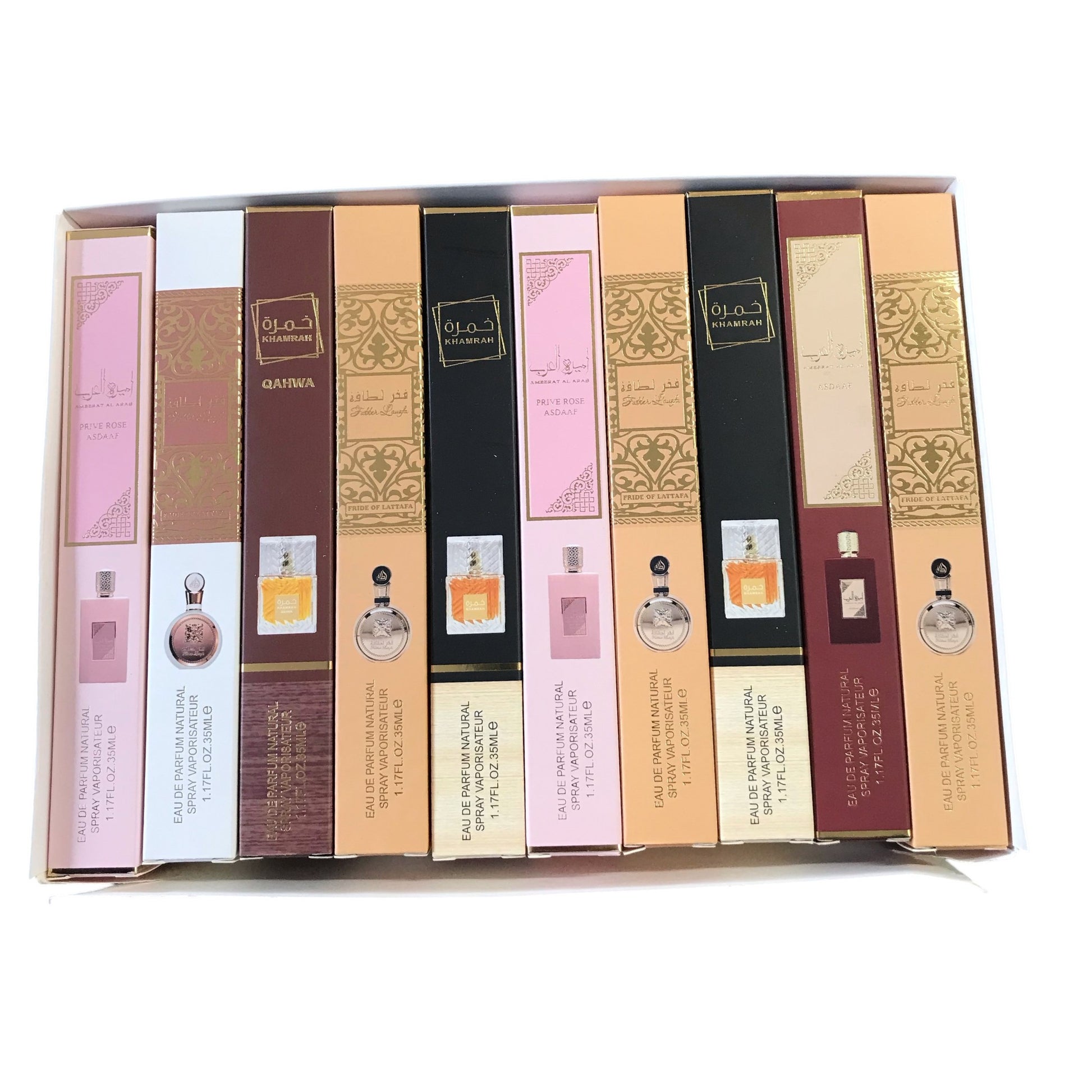 Collection of Olfactive Studio perfume bottles in a box on a white background