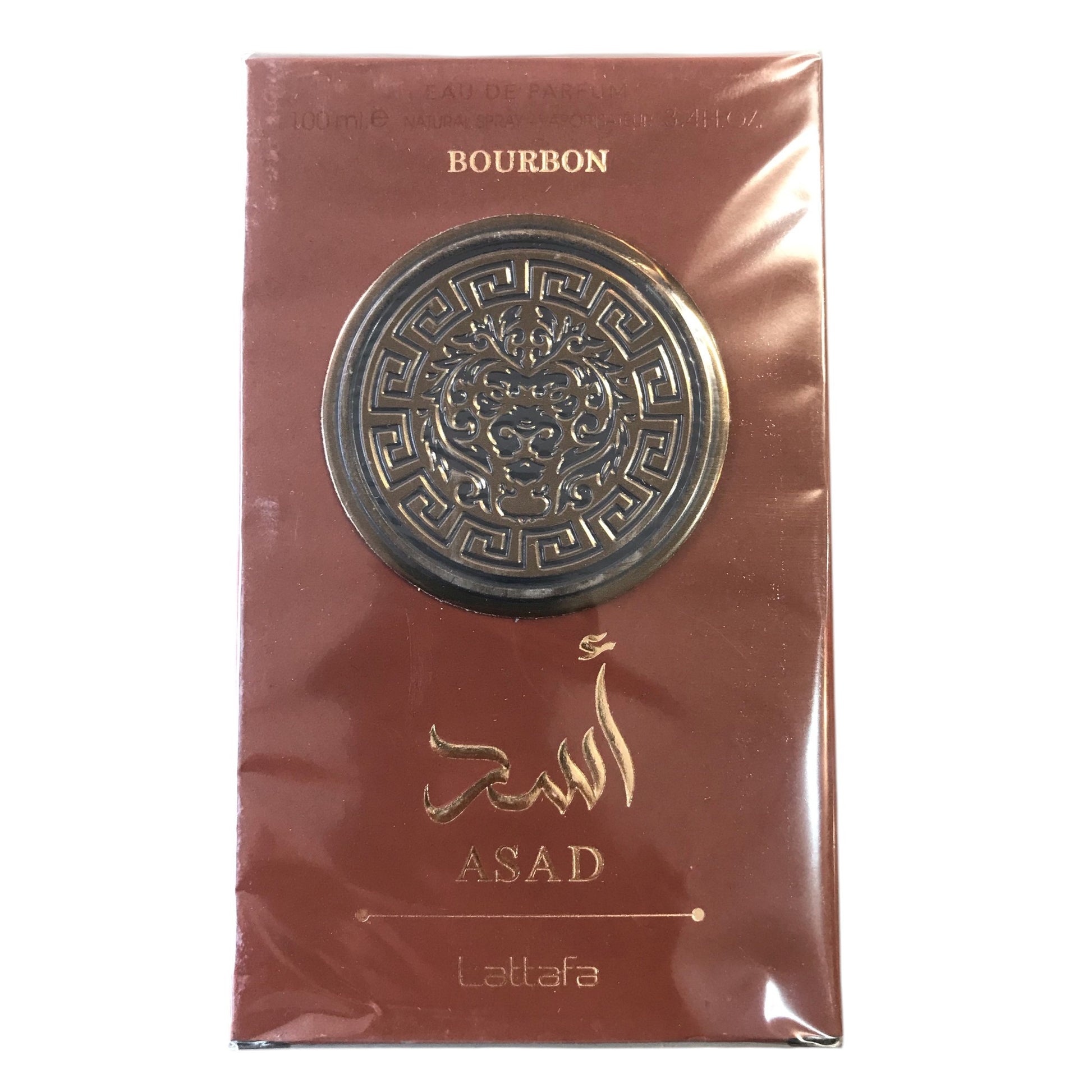 Lattaafa Asad bourbon packaging with decorative emblem and text on a white background